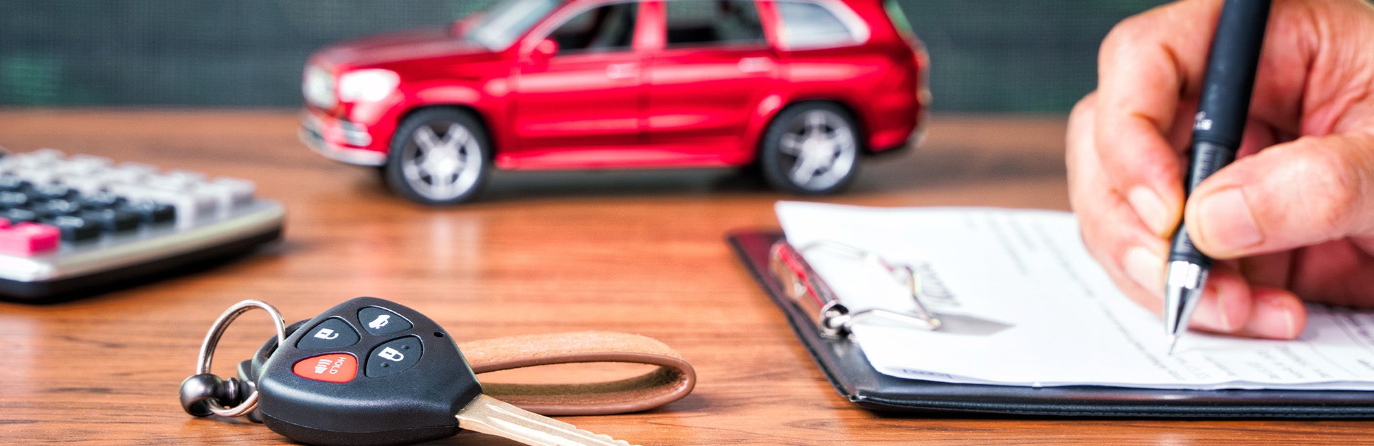is it better to buy a new or used car